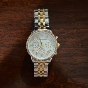 Michael Kors Gold and silver watch.